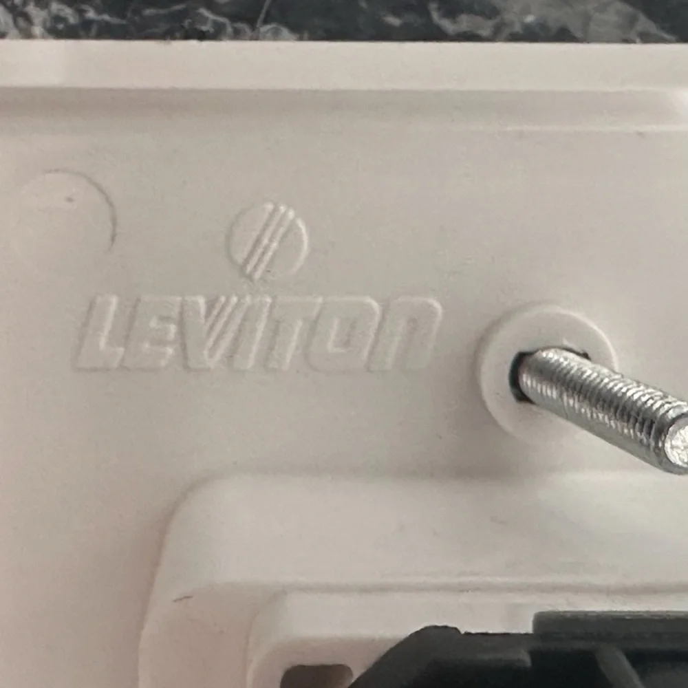 New White Leviton Recessed Wall Outlet with Built-in Wallplate & Screws
